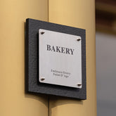Experience Luxury with Custom Flamed Stone Bakery Nameplates Sign