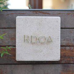 Handcrafted Excellence Customized Limestone and Brass Signs