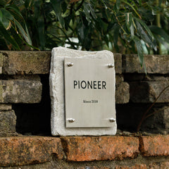 Tailored Limestone and Brass Nameplates for a Sophisticated Look