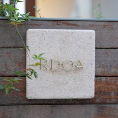 Handcrafted Excellence Customized Limestone and Brass Signs