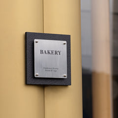 Experience Luxury with Custom Flamed Stone Bakery Nameplates Sign