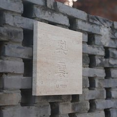 Elegant Custom Limestone Plaques for Refined Hotel Spaces
