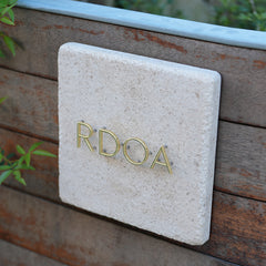 Handcrafted Excellence Customized Limestone and Brass Signs